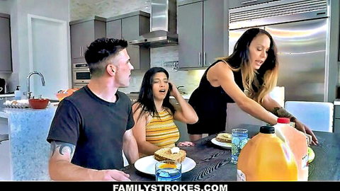 Busty Latina stepmom in black dress serves attention to stepson and stepsister in kitchen