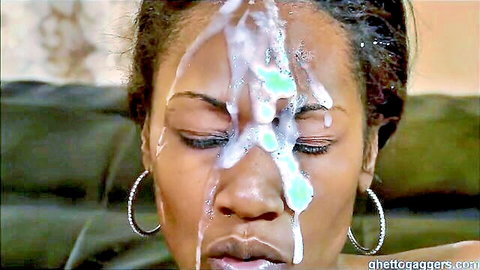 Ebony beauty with messy facial cumshot dripping on her face