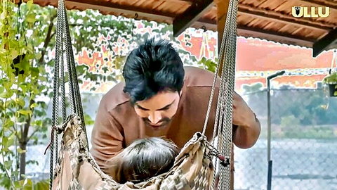 Mature Indian woman in hammock embraced by man in Ullu erotic scene
