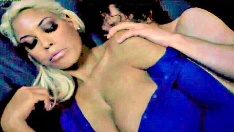 Busty blonde ebony in low-cut blue dress, intimate with stud, creampie action