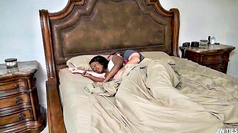 Ebony teen spooned by lover in interracial bedroom exposure