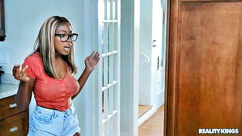 Curvy ebony babe in red tank top and shorts teases with massive ass for facesitting