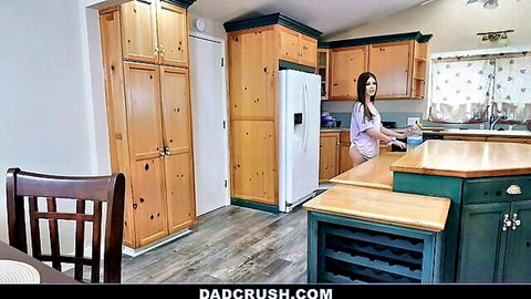Sexy stepdaughter in tank top and shorts teases in kitchen, ready for hot punishment