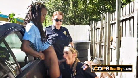 Horny female cops in uniform perform oral on BBC in hot interracial threesome