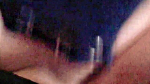 Blurry closeup of pale babe's neck gripped roughly by hands during intense action