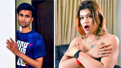 Shocked busty Indian MILF covers huge tits topless as young guy peeks from door