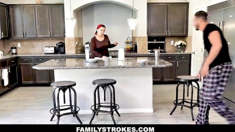 Stepdad sneaks up on busty stepdaughter in kitchen for taboo fuck