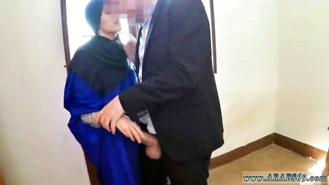 Young Indonesian maid in hijab seduced by suited man in hotel room