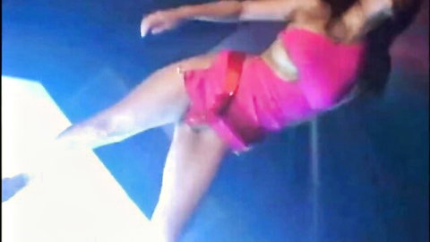 Japanese bikini dancer teasing in pink micro bikini, seductive pose