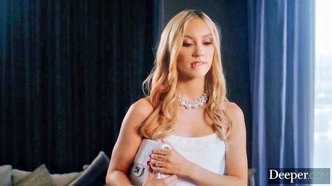 Jazmin Luv in white dress and necklace, blonde posing elegantly in Tushy scene
