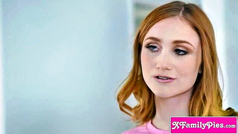 Scarlet Skies redhead teen in pink top, seductive gaze