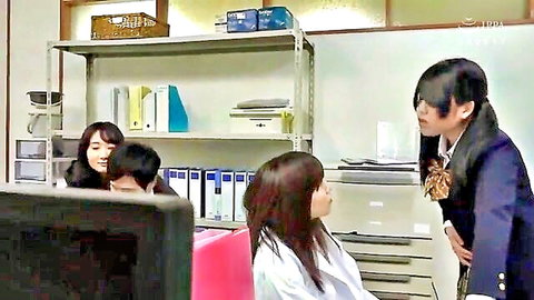 Japanese women in school uniforms chatting in office, JAV scene preview
