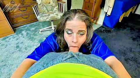 Mature brunette MILF in blue satin robe puckers lips on thick cock POV