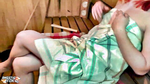 Redhead babe in steamy sauna towel spreading legs teasing bare pussy voyeur style