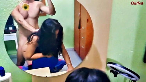 Muscular naked man pulls young Latina's long hair from behind in mirror with erect cock visible, her in pink knee socks amateur rough sex