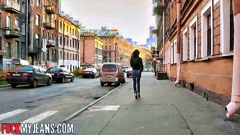Mya Dark hot Bulgarian brunette walking in tight jeans on urban street