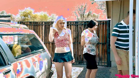 Blonde teen in striped micro skirt and busty brunettes in mini skirts tease cleavage outdoors by van