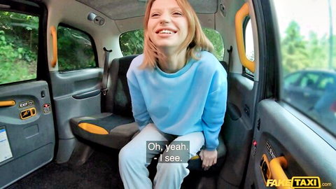 Molly DeVon smiling in blue sweatshirt in Fake Taxi POV, job hunt turns wild