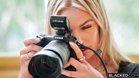 Kylie Rocket blonde model posing with Canon camera in Blacked interracial scene