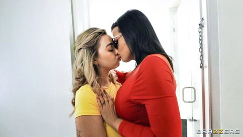 Nadia White and Chloe Surreal share a steamy kiss in Brazzers threesome