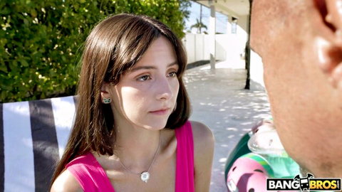 Serena Hill in pink top chatting with stepdad Peter Fitzwell by pool