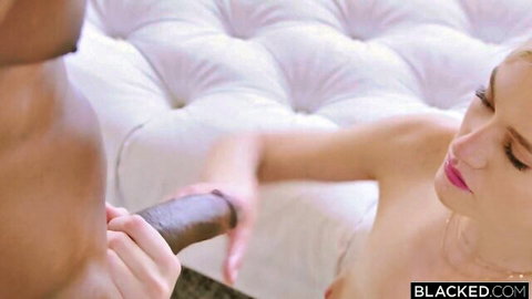 Mazzy Grace holds Jax Slayher's big black cock close-up in Blacked interracial scene
