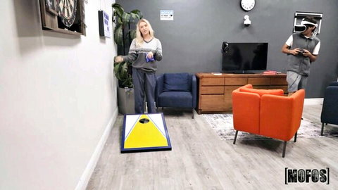 Krissy Knight and Victor Ray in casual grey outfits playing games before freaky dorm action