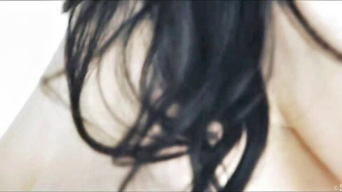 Angel Princess close-up in hot lingerie, long dark hair flowing