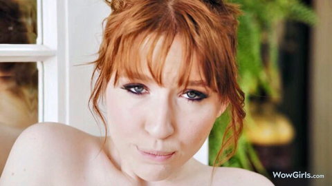 Lilly Mays redhead topless seductive pose in pantyhose solo