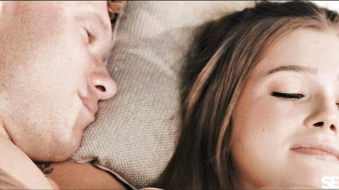 Olivia and Liam cuddling intimately in bed, Czech threesome preview