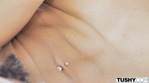 Kira Noir's toned ebony body with navel piercing in kinky Tushy scene