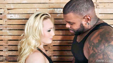 Blonde in lingerie close to muscular black stud, intimate interracial tease