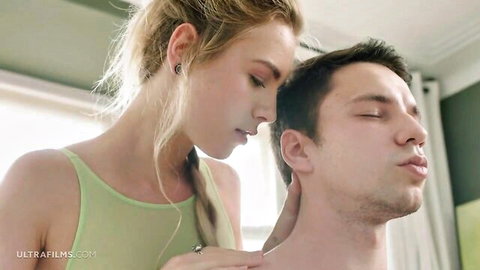 Alecia Fox in green lingerie intimately teasing man's neck