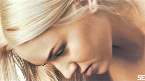 Blonde model Barbie Brill in seductive close-up tease from MetArt striptease