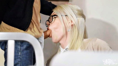 Izzy Wilde blonde shemale giving blowjob to black stud in library
