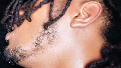 Black stud with dreads and beard in intense gaze for Avi Love & Adriana Chechik Blacked scene