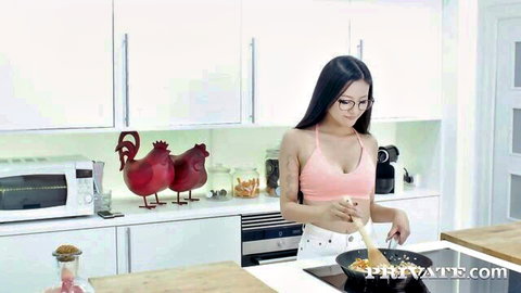 Rae Lil Black cooking in revealing pink top, sexy Asian babe in kitchen