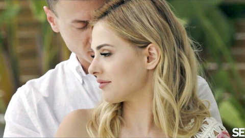 Mini Vamp and Charlie Dean in intimate striptease embrace, blonde beauty in lace top