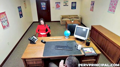 Tiffany Fox in red dress at principal's desk with Sergeant Miles