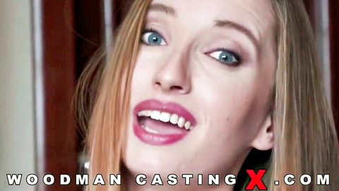 Trixxxie Fox smiling in Woodman Casting X debut, blonde beauty first time