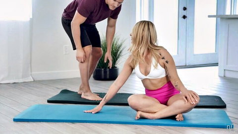Whitney OC in steamy yoga pose with Codey Steele, blonde in white sports bra and pink shorts