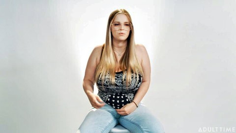 Blonde bombshell Codi Vore in sexy black top and jeans for hot toy interview