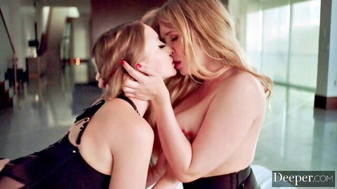 Two busty blondes passionately French kissing topless in black lingerie