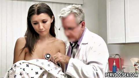 Petite Maya Woulfe topless in medical exam, doctor using stethoscope on breasts