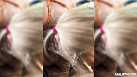 Chloe Surreal blonde with pigtails in orange summer dress in car