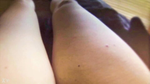 Pale white thighs spread wide teasing shaved pussy closeup