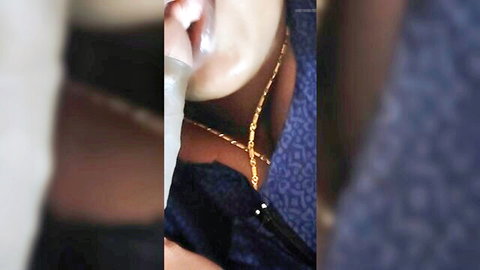 Tamil wife with cum in mouth, gold necklace and blue dress cleavage