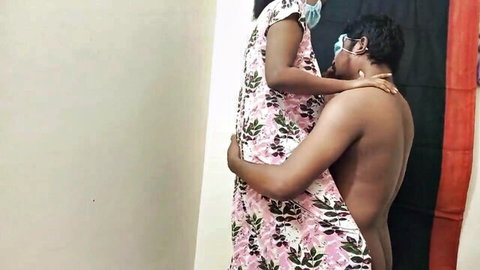 Desi aunty in floral dress hugged from behind by shirtless tenant