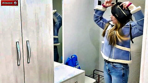 Alina Rai hot blonde MILF in sexy fur jacket, trying on hat