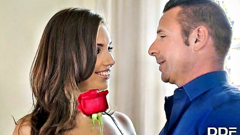 Brunette smiling close to man with red rose, teasing anal wife scene